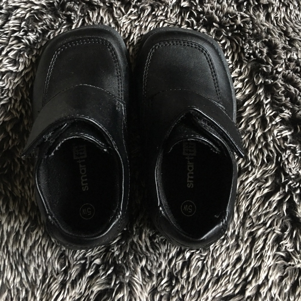 Boys black dress shoes.